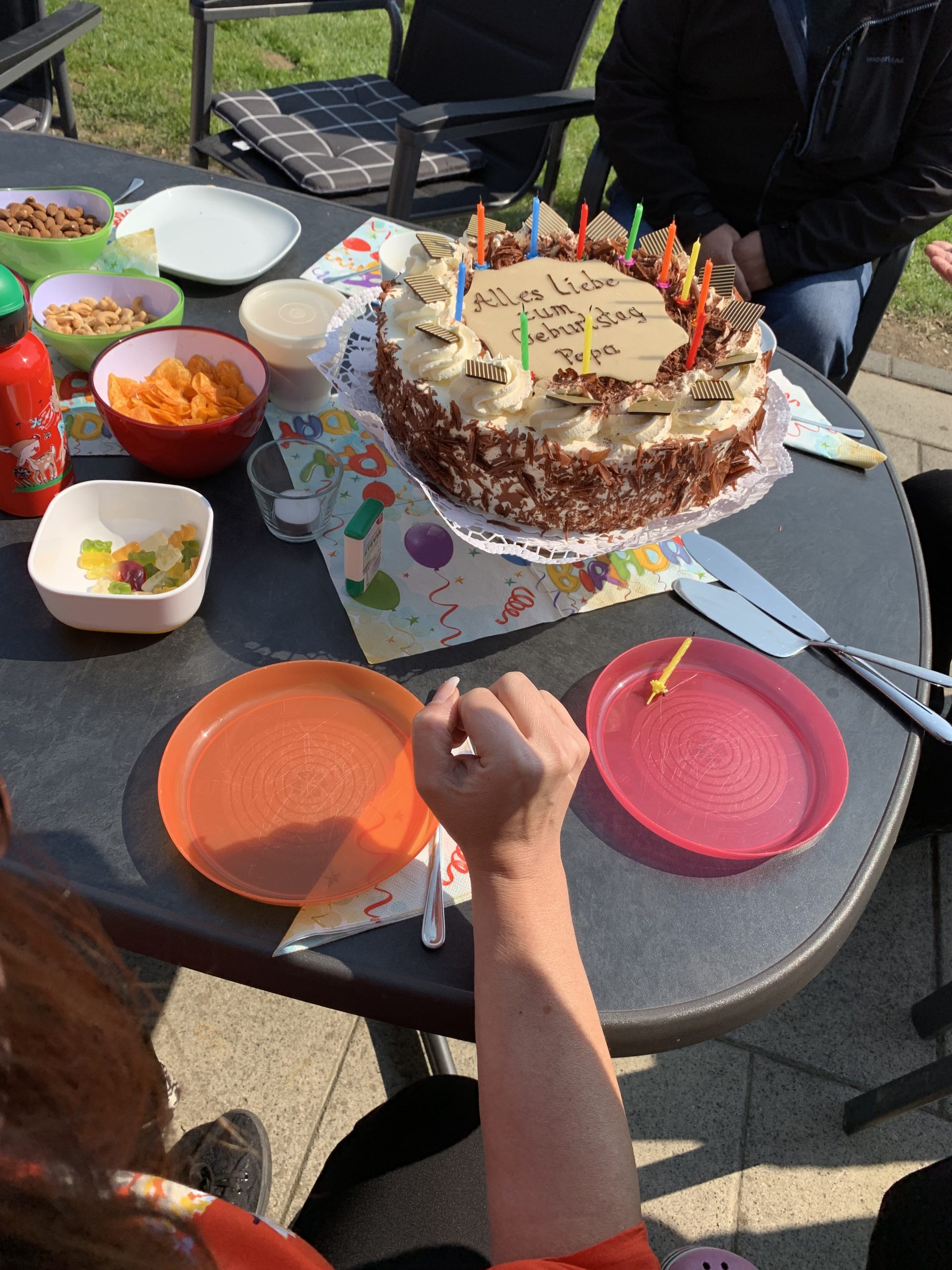 high-angle-view-hand-holding-cake-table