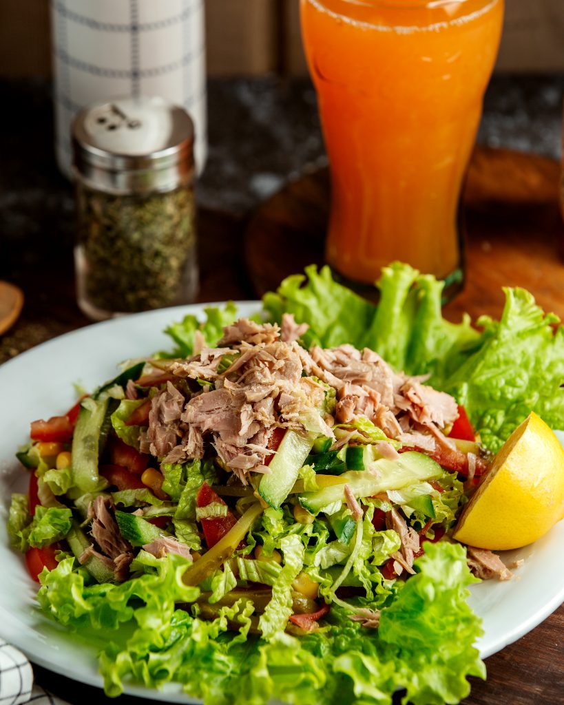 tuna salad and glass of juice